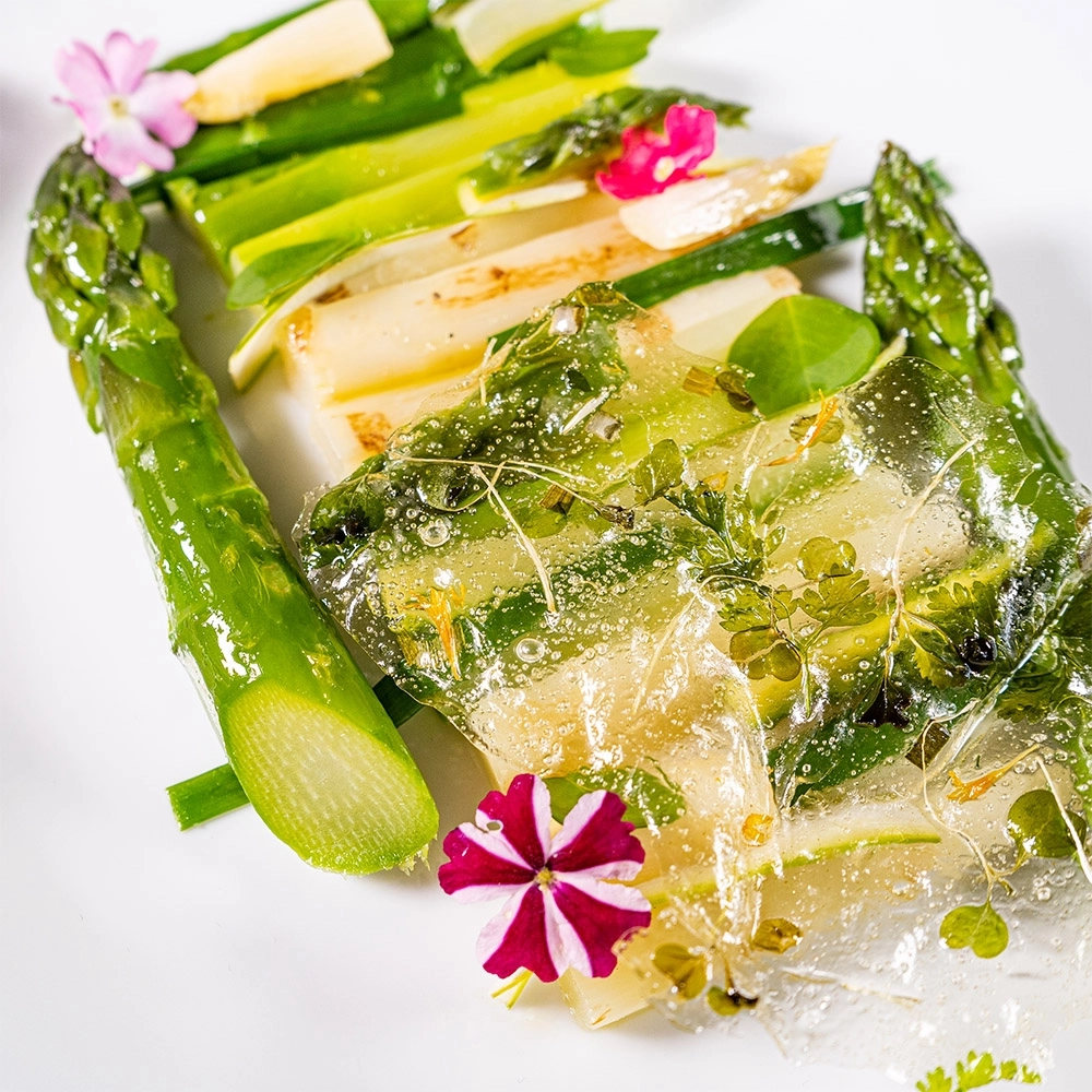 Textures and temperatures of green and white asparagus, with ‘stained glass’ herbs